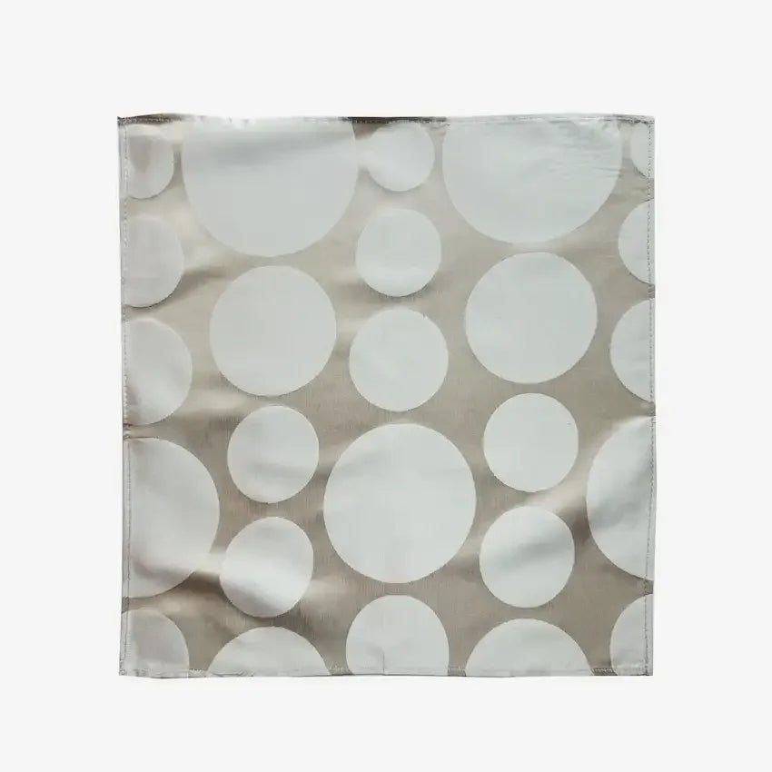 Sand jacquard gift wrap with round polka dot pattern, flat lay view