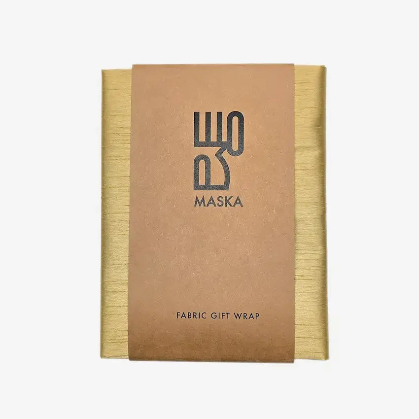 Lemonade yellow raw silk gift wrap folded with Maska kraft paper band