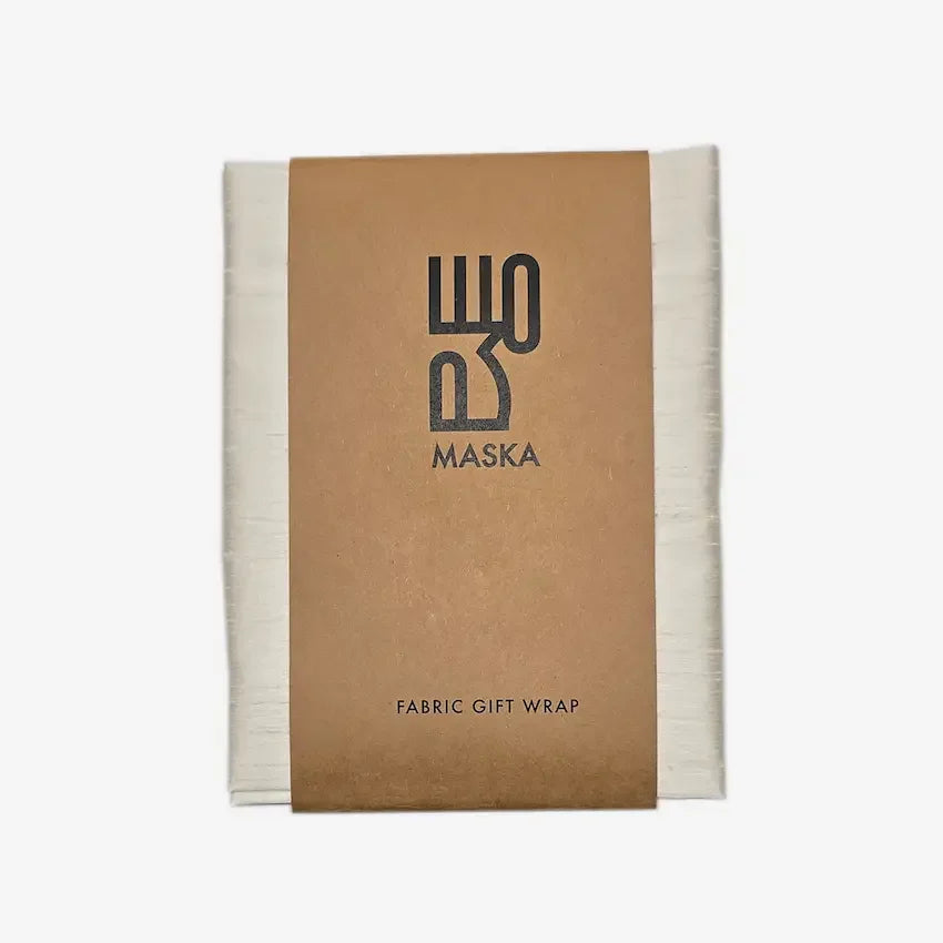 Off white raw silk gift wrap folded with kraft paper Maska band