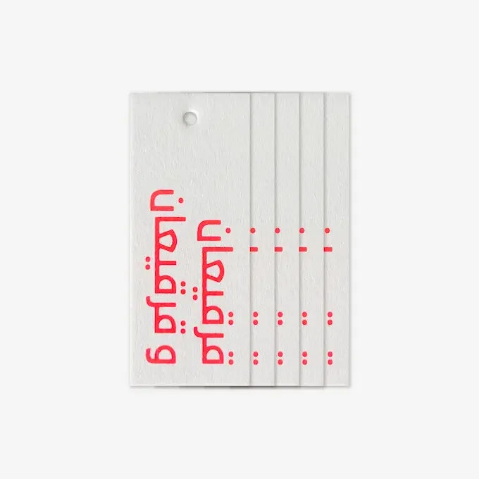 Set of five Gergaian gift tags with neon orange Arabic script and perforated edges