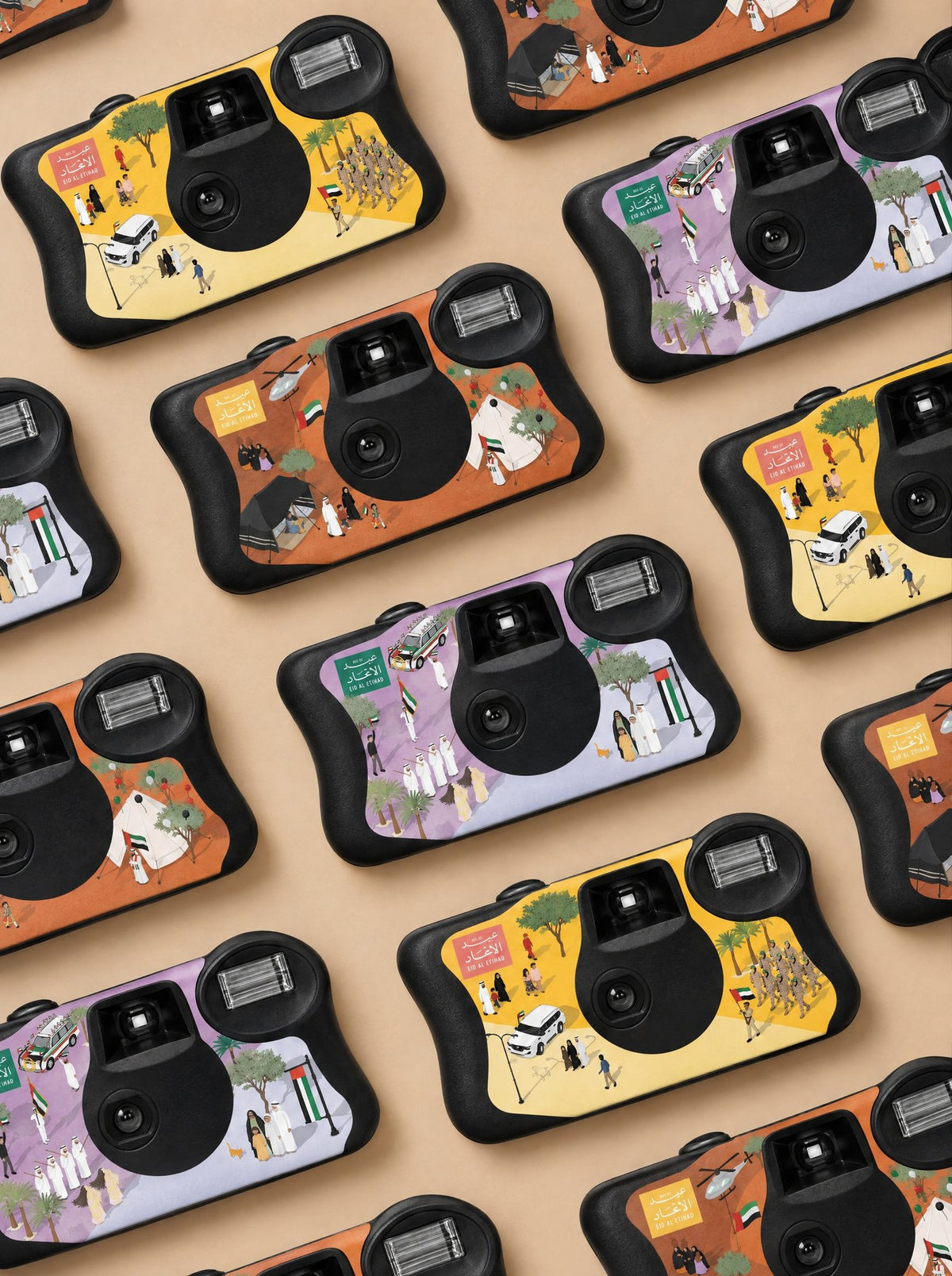 Rows of Eid Al Etihad disposable cameras in yellow, lilac and brown
