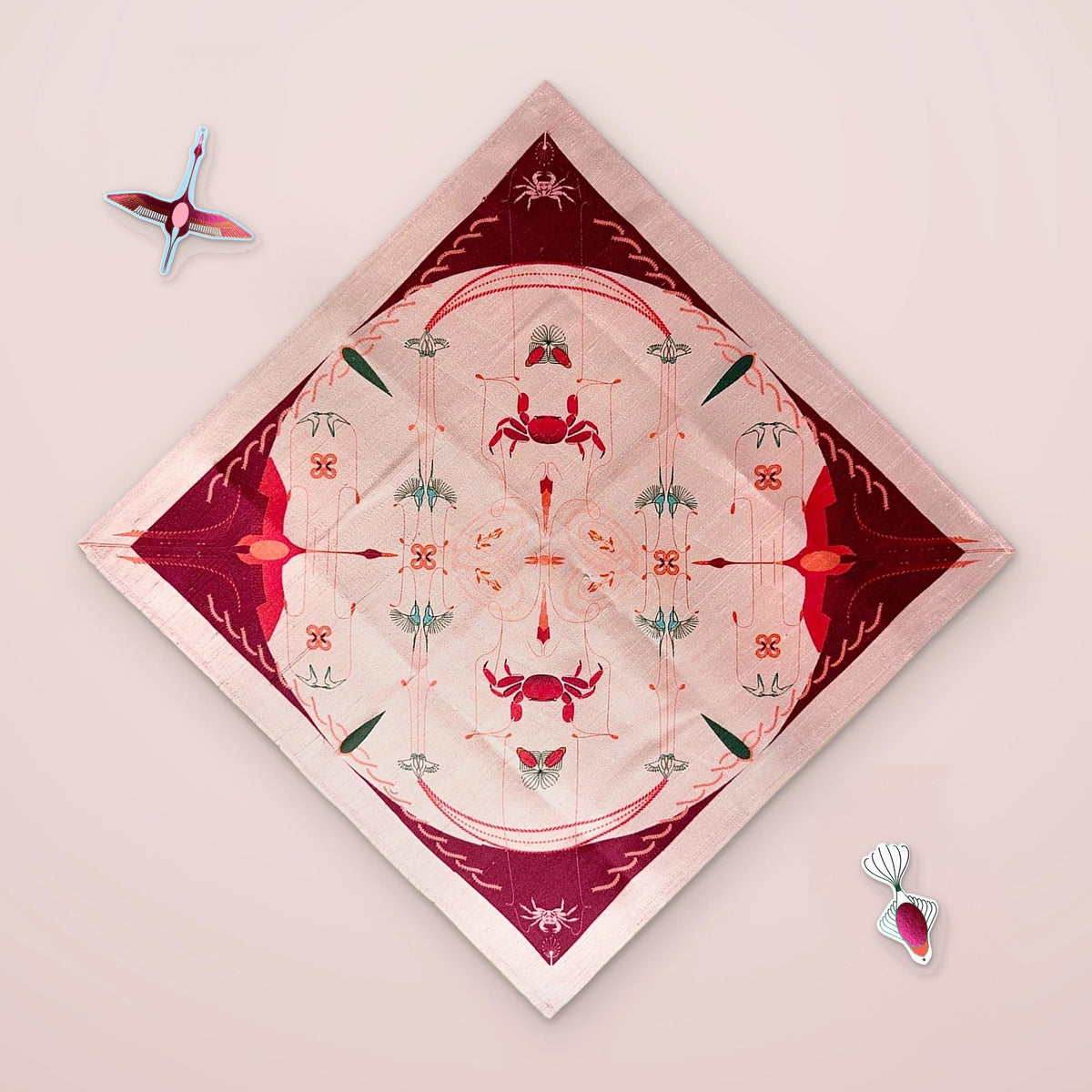 Stories of Isle and Inlet fabric wrap with Maraj flamingo and fish trinkets